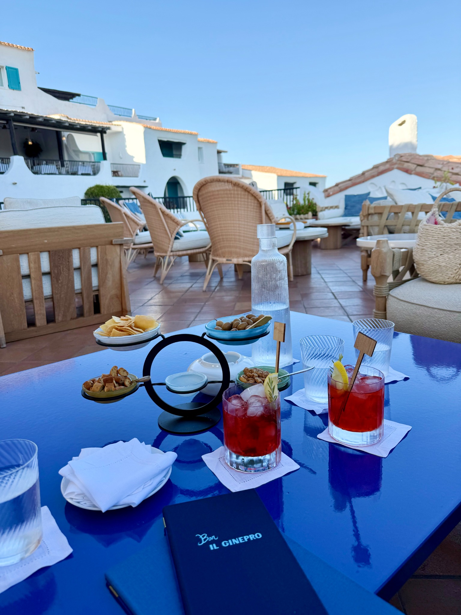 Aperitivo drinks and small bites on a terrace in Sardinia